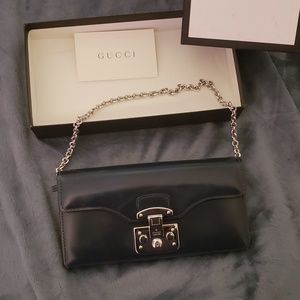 Gray/blue Gucci clutch